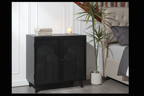 Modern black accent cabinet in bedroom