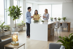 Corporate office break room with diverse coworkers and Gold Flower Glass Fragrance Oil Warmer