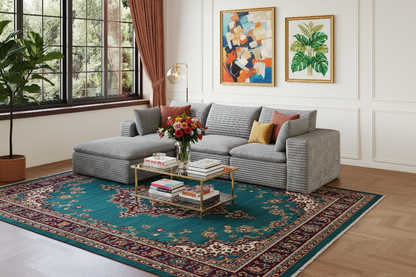 Light gray ribbed corduroy L-shaped sectional sofa in a vibrant colorful living room with two wall art pieces