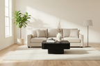 Black square coffee table styled in a bright modern living room