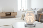 Scandinavian living room with White Angel Wings oil burner in foreground