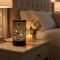 Butterfly Mosaic Wax Warmer on marble nightstand with white flowers